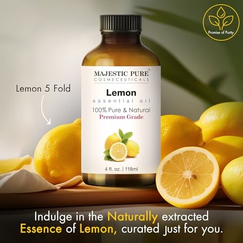 Bottle of Majestic Pure lemon essential oil with lemons.